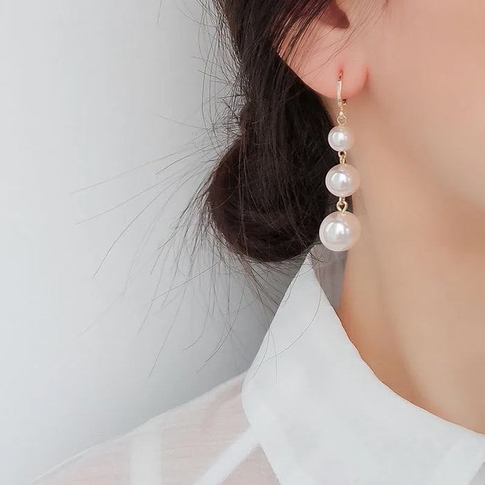 Boucles d’Oreilles Perles Irrégulières – Élégance Naturelle & Design Moderne